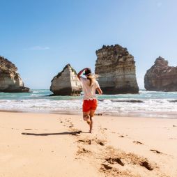 walking barefoot on the sand at at Childers Cove
