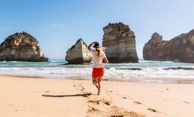 walking barefoot on the sand at at Childers Cove