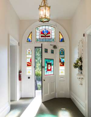 The front door with stain glass windows at The Florance.