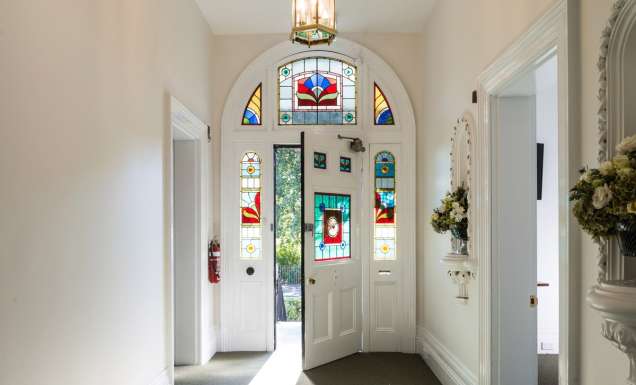 The front door with stain glass windows at The Florance.