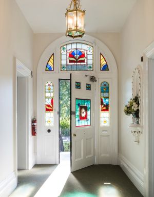 The front door with stain glass windows at The Florance.