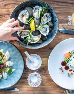 share plates on the table at Melaleuca, Port Douglas