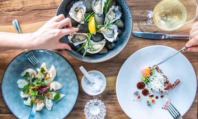 share plates on the table at Melaleuca, Port Douglas