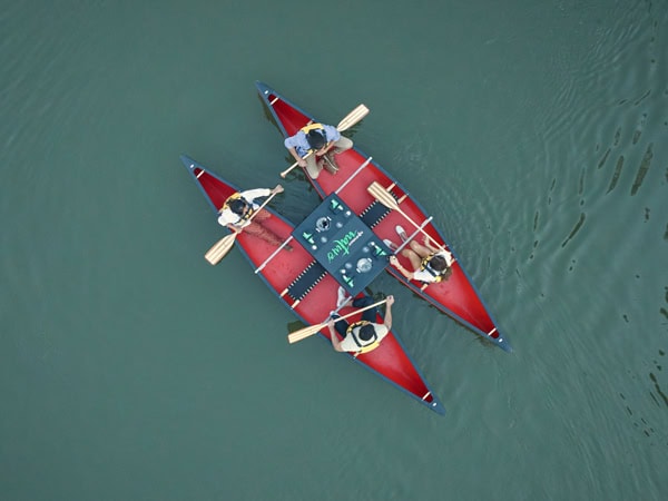an aerial view of people canoeing on Yarrunga Creek, Canoes, Cool Climate Wines & Canapes