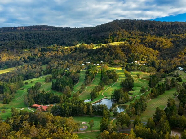 an aerial view of the green pastures surrounding Kangaroo Valley Golf