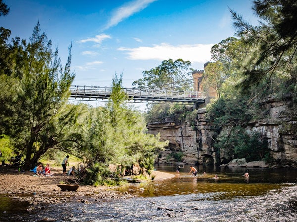 people swimming under the famous Hampden Bridge, Kangaroo Valley