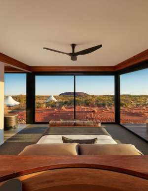 a look inside a luxury tent with scenic views of Uluru at Longitude 131