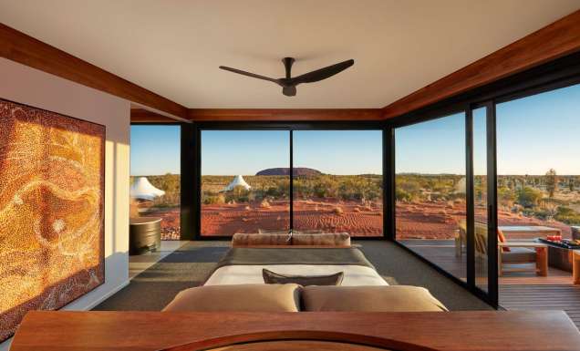 a look inside a luxury tent with scenic views of Uluru at Longitude 131