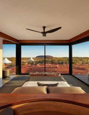 a look inside a luxury tent with scenic views of Uluru at Longitude 131