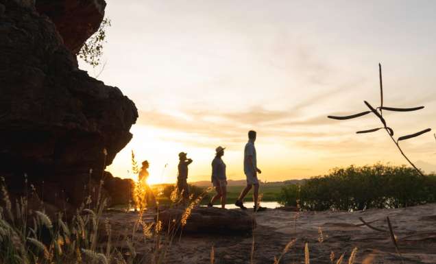 people walking at sunset during Kakadu Cultural Tours