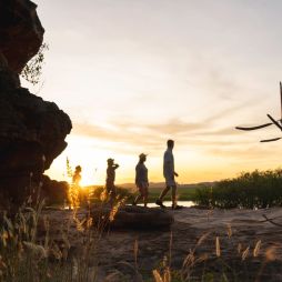 people walking at sunset during Kakadu Cultural Tours