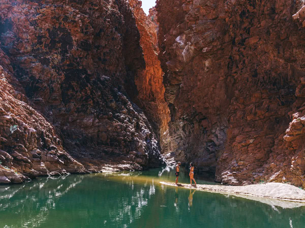 a couple walking along Redbank Gorge