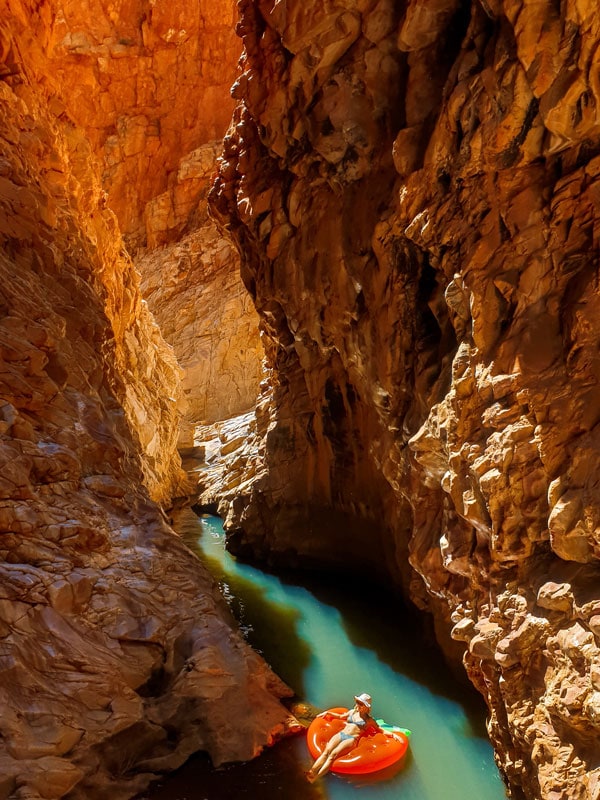 a woman floating on Redbank Gorge