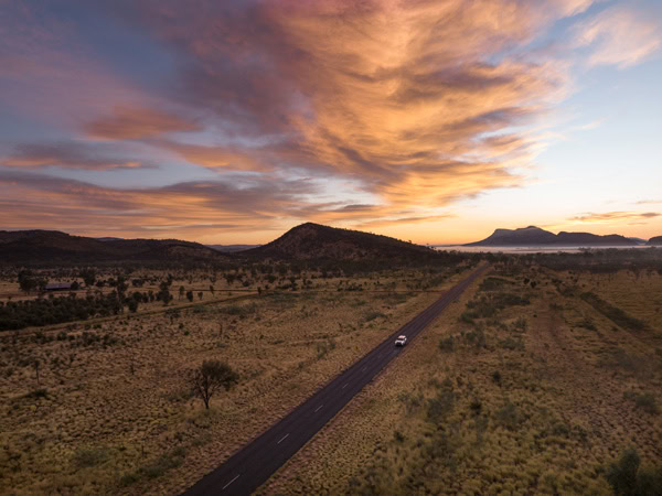 driving along West MacDonnell Ranges