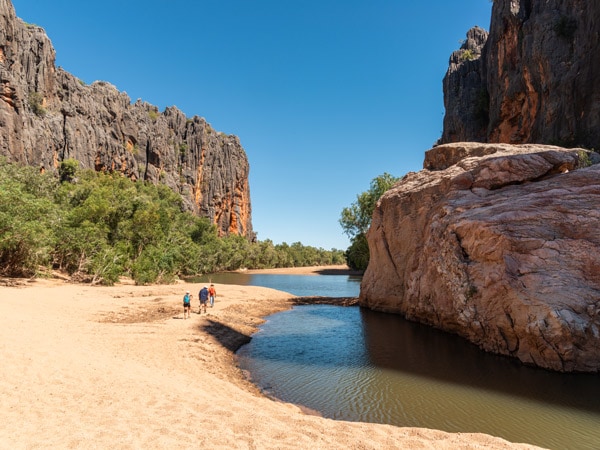 people on a walking trail along Windjana Gorge National Park