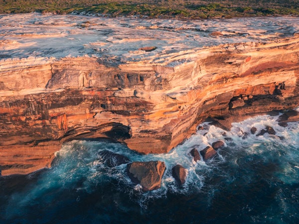 sandstone cliff walls lining the Kamay Botany Bay National Park, Kurnell