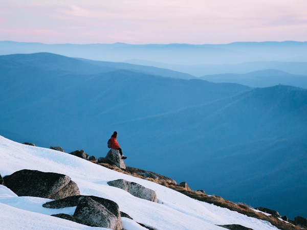 a woman enjoying the scenic views across Kosciuszko National Park