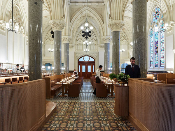 the cathedral-esque dining interior of Reine & La Rue
