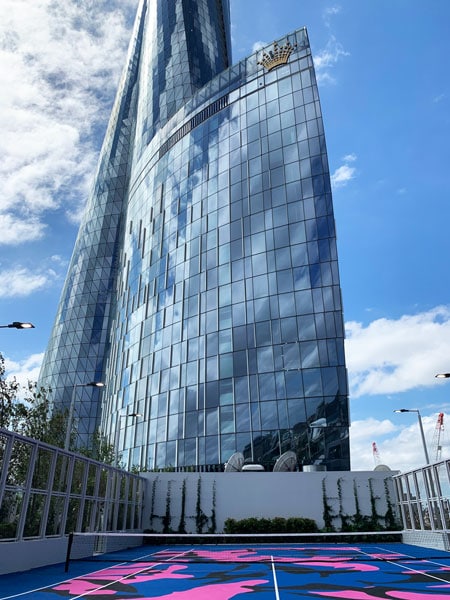 The striking open-air tennis court on level six of Crown Towers Sydney