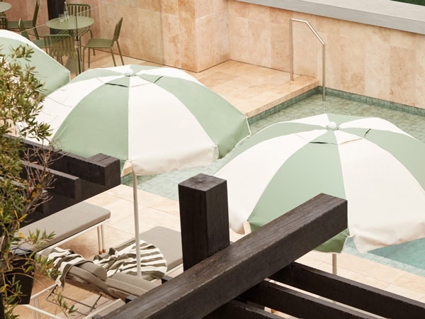 poolside umbrellas and sun loungers at Hotel Sorrento