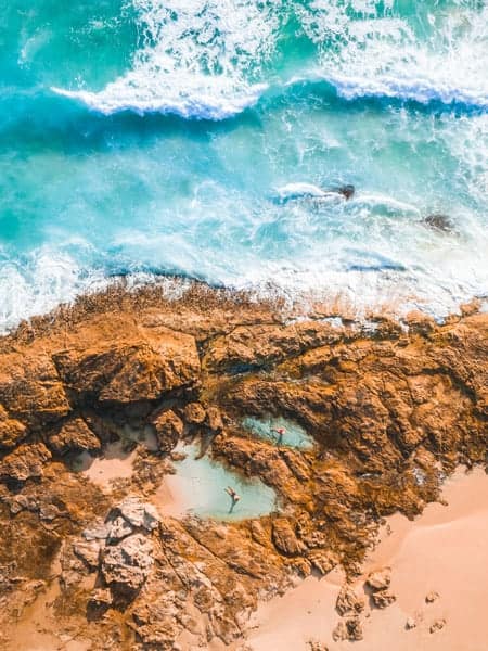 Explore North Straddie's Main Beach and rock pools.