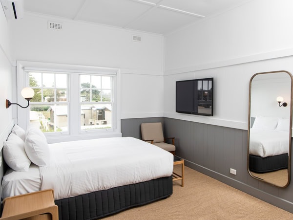 a standard room with a queen bed at Portsea Hotel, Mornington Peninsula