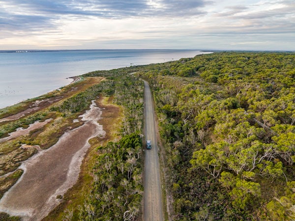 Car driving on road on French Island