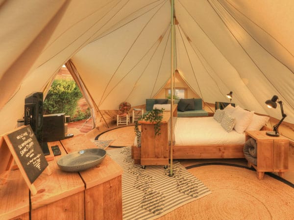 Inside the luxurious glamping tents at Scamander Sanctuary Holiday Park.