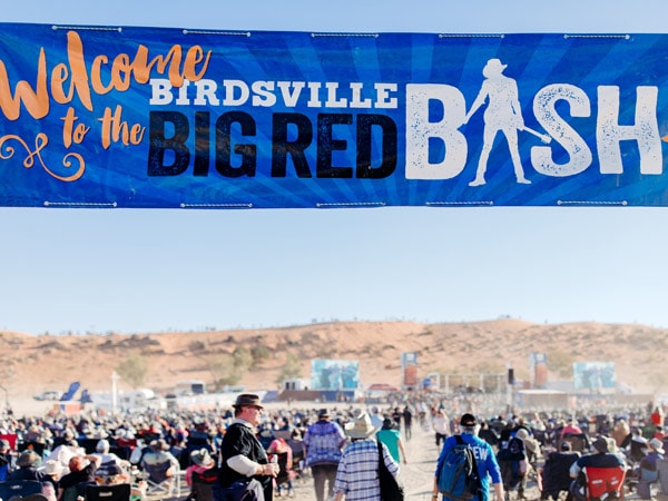 A sign says welcome to the Birdsville Big Red Bash. (Image: Tourism and Events Queensland)