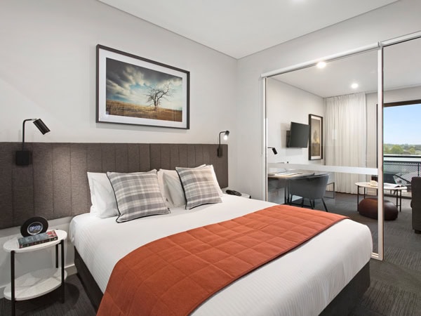 the bedroom at Quest Orange