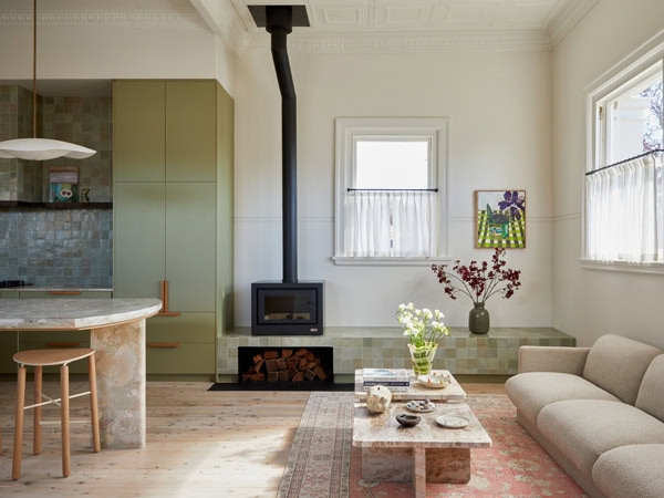 a look inside the accommodation with a fireplace at Sona Molong, Orange