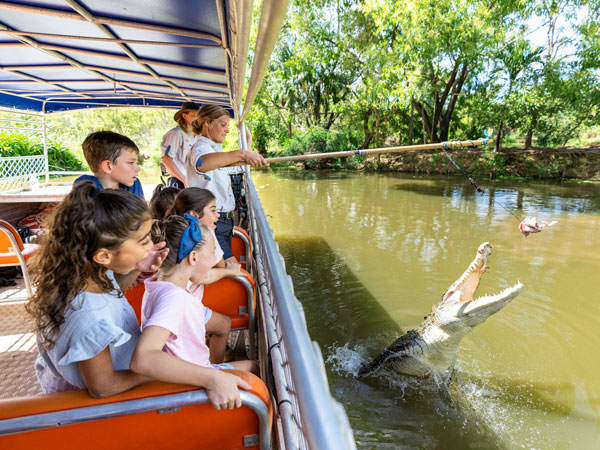 feeding a croc at Crocodylus Park, Darwin