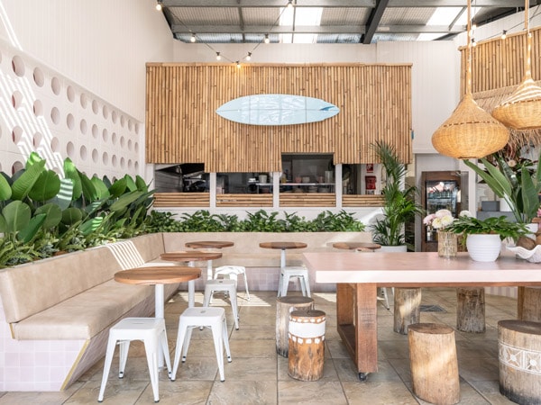 a chic and minimalist cafe interior at Combi Byron Bay