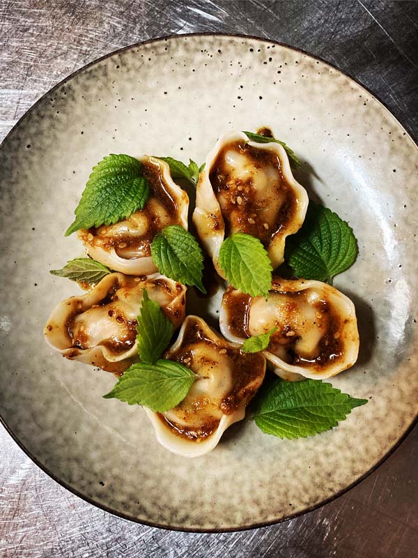 a plate of dumplings at Mangosteen, Byron Bay