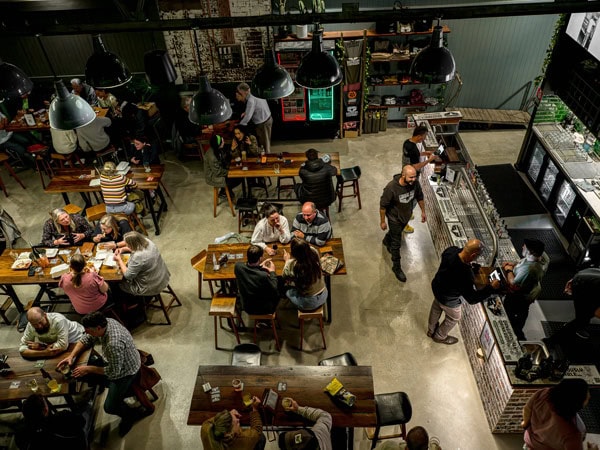 people enjoying inside Badlands Brewery, Orange