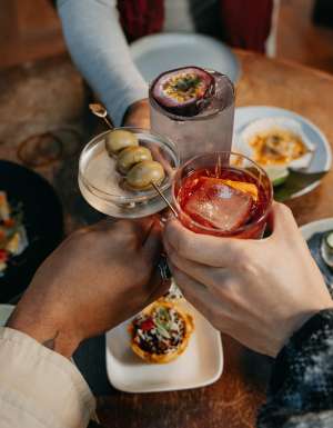 clinking cocktail glasses at Grainery Lane, Ballarat