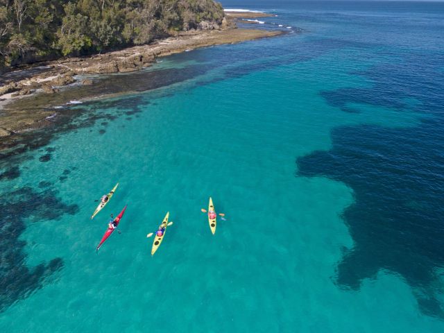 friends kayaking in Jervis Bay