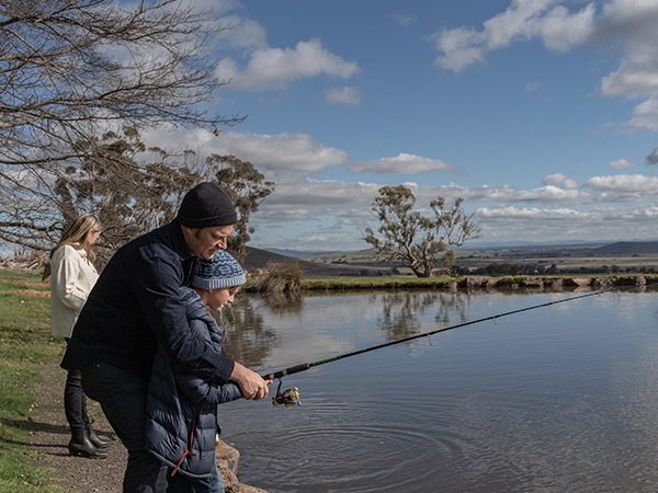 catching fish with kids at Tuki Trout Farm, Ballarat