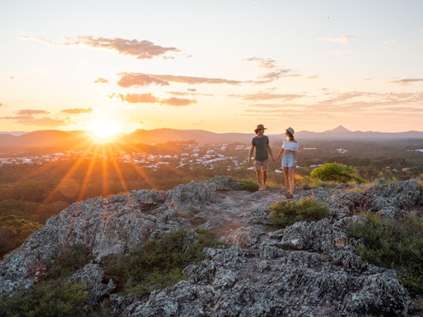 two people gazing at incredible sunrise views, Emu Mountain Summit Walk