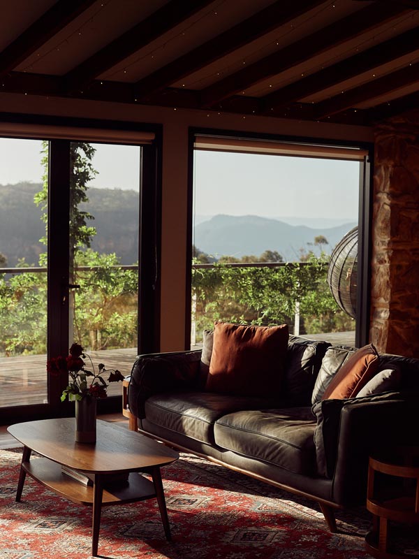 Lounge area inside Machinery Shed at Logan Brae Retreats Blue Mountains