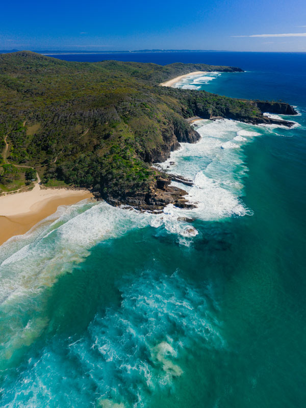 an aerial view of Sunshine Beach looking towards Noosa National Park