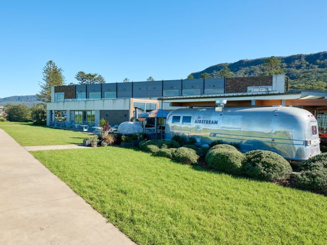 a vintage Airstream travel trailer at Headlands Austinmer Beach