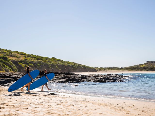 surfers at Killalea Beach