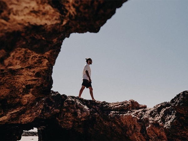 Man wanders through Forrest Caves.