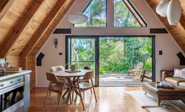 a look inside an A-frame log cabin at Eh Frame, Noosa National Park