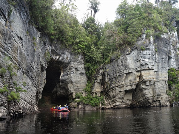 Docking the rafts to explore the Lost World Canyon