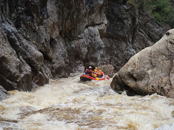 Franklin River Rafting guides negotiate a notorious rapid in the Great Ravine
