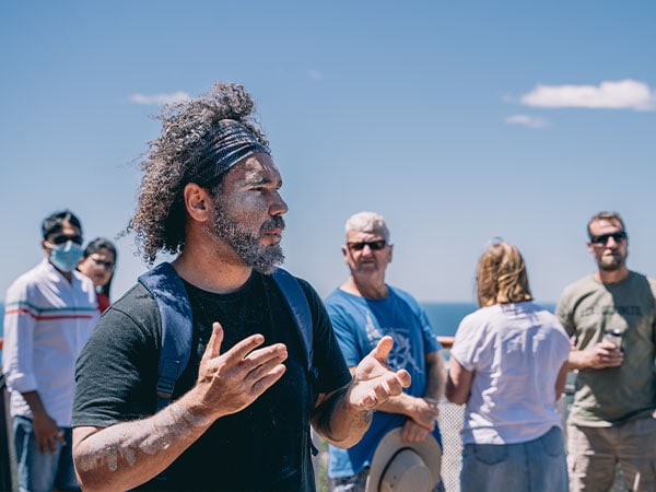 Nathan Brennan sharing a story