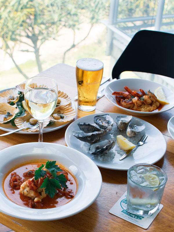a spread of food on the table at Pacific Hotel, Yamba