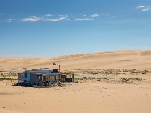 a fishing shack in the Tin City on Stockton Beach